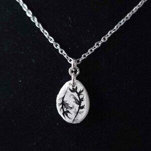 Vintage iridescent white pearl boho feather necklace with a small silver chain